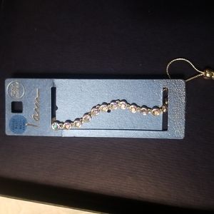 Mother of pearl stones in a silver adjustable bracelet.